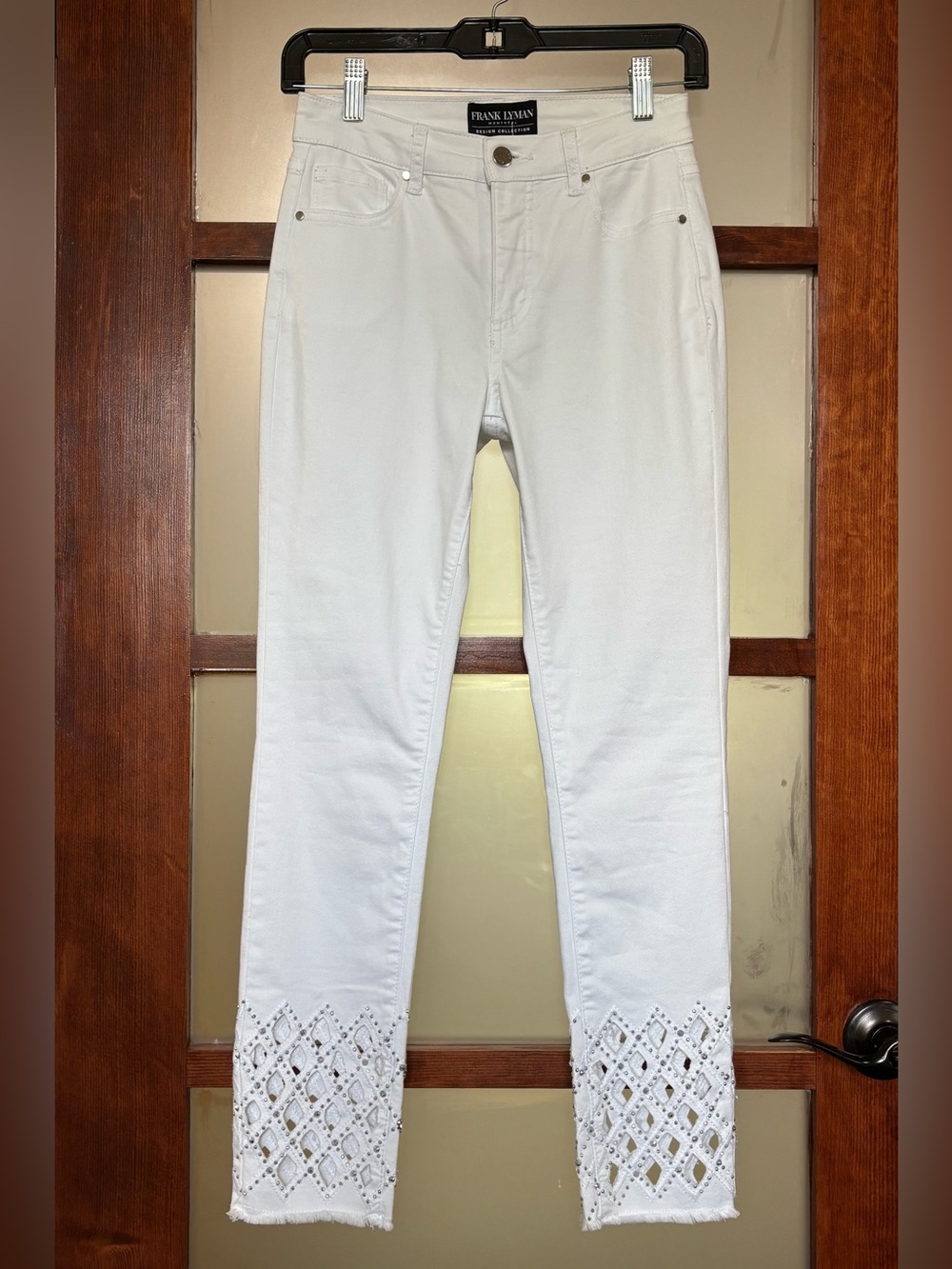 Frank Lyman Design White Skinny Jeans with Embroidered Lattice Hem
